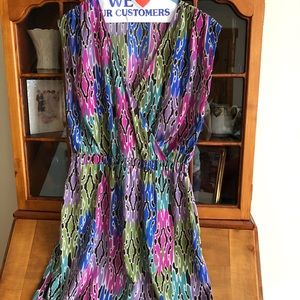 V-Neck bright patterned dress with cinch waist.